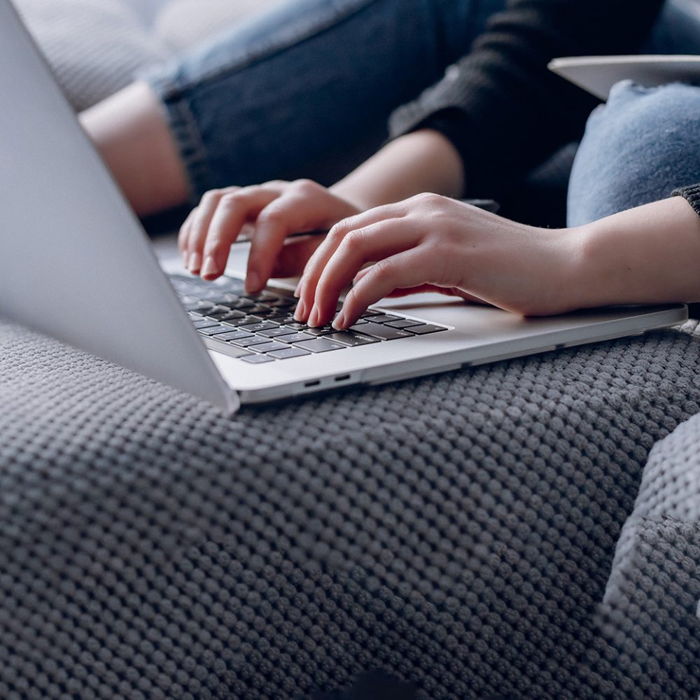 close-up-female-hands-typing-stylish-laptop-modern-interior-work-online-laptop
